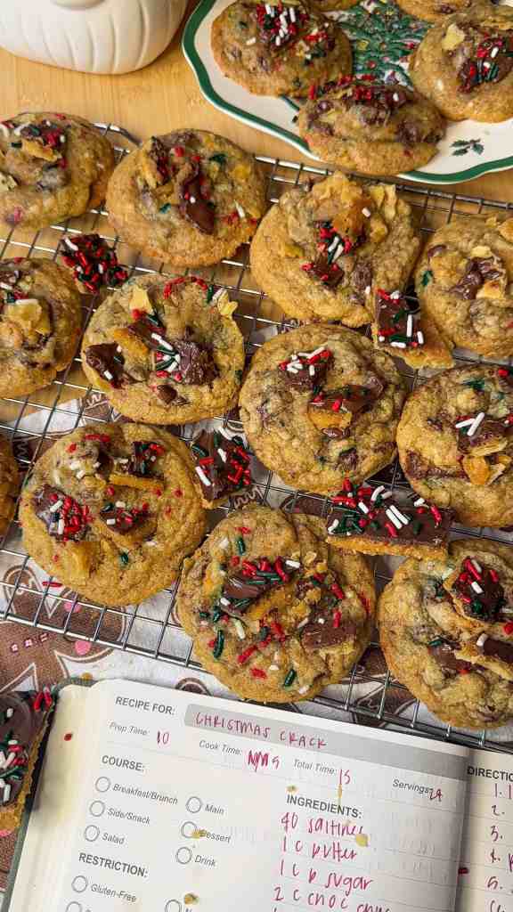 my christmas crack chocolate chip cookies lined up on a cooling rack after baking