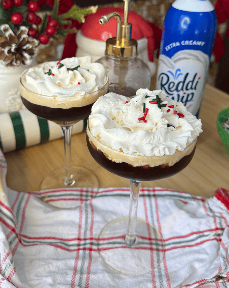 two sugar cookie espresso martini in a martini glass