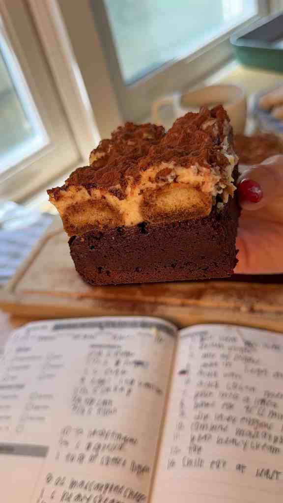 me holding my brown butter tiramisu brownies